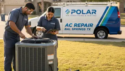 Professional AC repair technician servicing air conditioner unit in Dallas TX home
